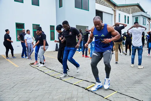 A workplace team taking part in a Body Justice Fitness activity